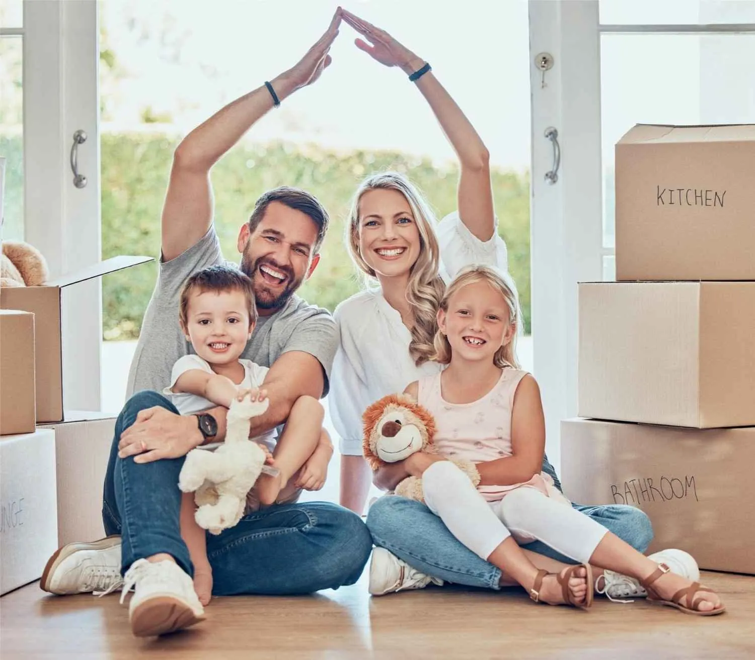 Family at home under a roof made with their hands